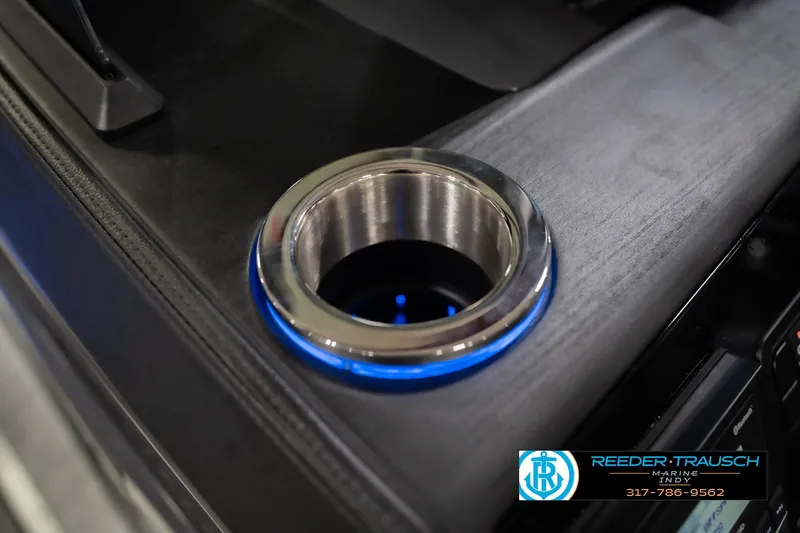 Slide: The Image of Cup holder with blue LED light on 2026 Bennington 24 MOFB boat console. - 51