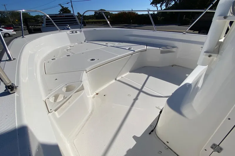 Slide: The Image of 2023 Boston Whaler 190 Montauk boat interior with seating and storage compartments. - 6