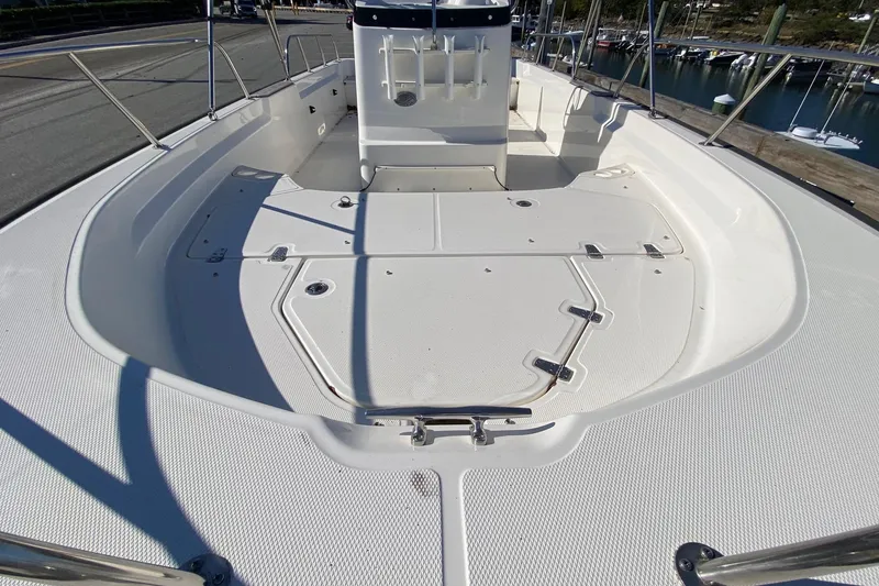 Slide: The Image of 2023 Boston Whaler 190 Montauk boat deck, spacious and well-equipped for marine adventures. - 7