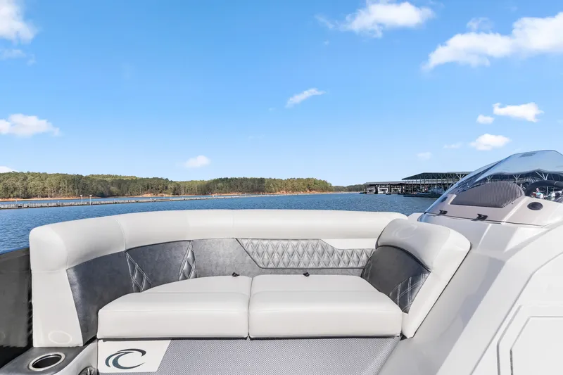 Slide: The Image of 2021 Crest Classic DLX 220 SLRC boat interior with lake view. - 11