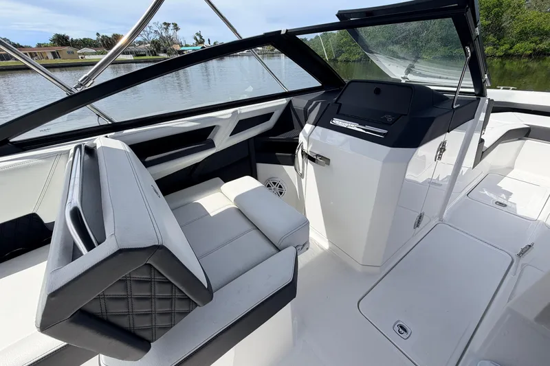 Slide: The Image of 2026 Cobalt R6 Outboard boat interior with sleek seating and modern dashboard design. - 12