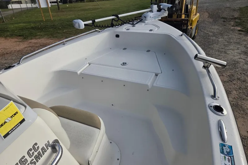 Slide: The Image of 2016 Key West 176 Center Console boat interior with seating and storage. - 10