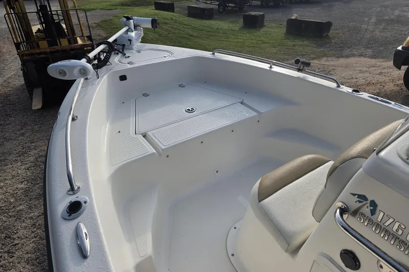 Slide: The Image of 2016 Key West 176 Center Console boat interior with seating and storage compartments. - 18