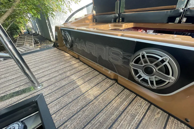 Slide: The Image of 2026 Harris Grand Mariner 230 SLDH boat with sleek design and premium audio system. - 16