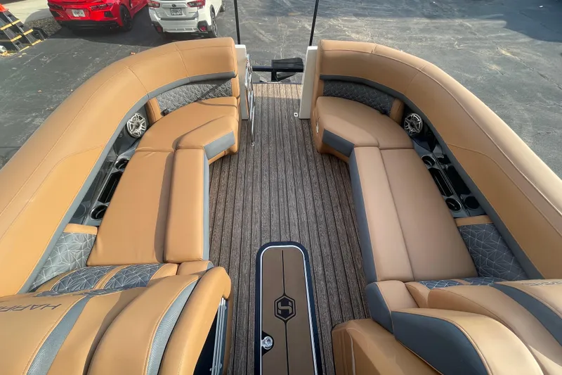 Slide: The Image of Luxurious interior of 2026 Harris Grand Mariner 230 SLDH pontoon boat with tan seating. - 7