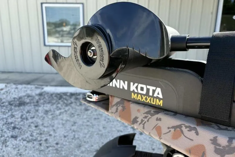 Slide: The Image of Minn Kota Maxxum motor on 2026 Xpress H20 Bass boat, close-up view. - 2