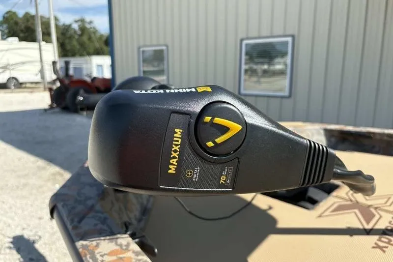 Slide: The Image of Minn Kota Maxxum trolling motor on 2026 Xpress H20 Bass boat. - 5