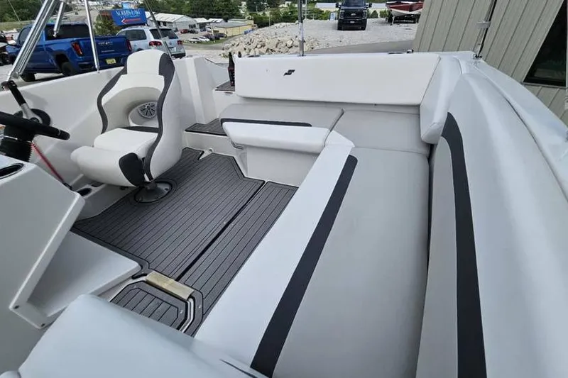 Slide: The Image of 2023 Starcraft SVX 171 OB boat interior with sleek seating and modern design. - 10