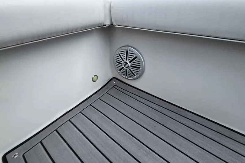 Slide: The Image of 2023 Starcraft SVX 171 OB boat interior with speaker and non-slip flooring. - 11