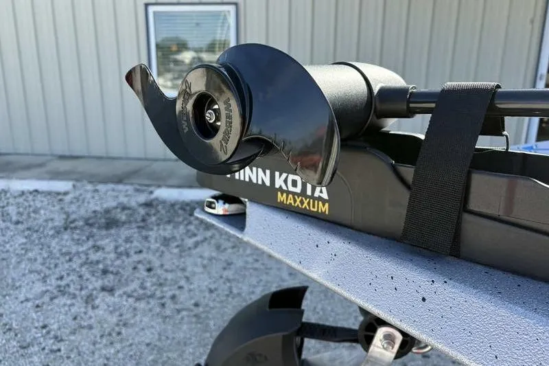Slide: The Image of Minn Kota Maxxum motor on 2026 Xpress H20 Bass boat, close-up view. - 10