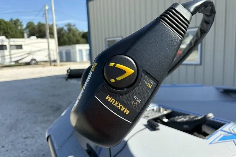 Slide: The Image of Close-up of Minn Kota Maxxum trolling motor control on 2026 Xpress H20 Bass boat. - 7