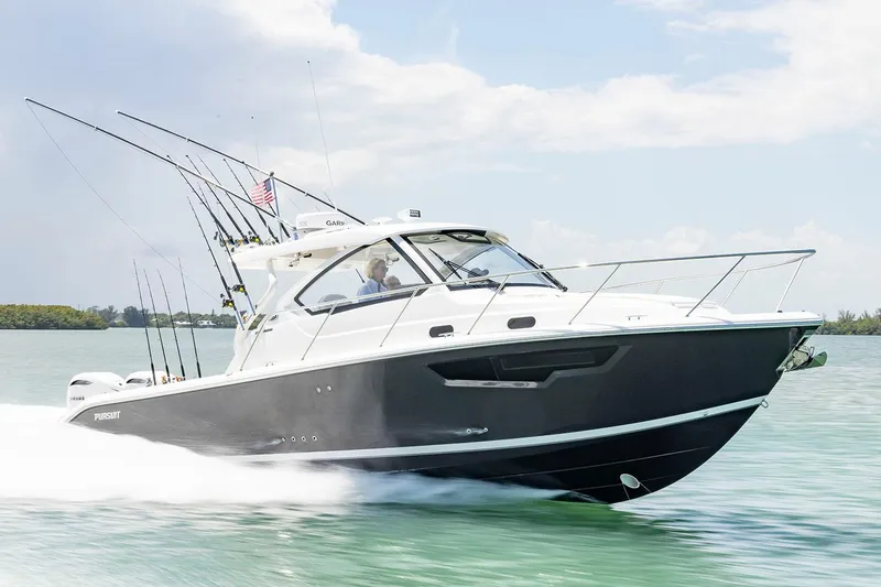 Slide: The Image of Manufacturer Provided Image: 2025 Pursuit OS 325 Offshore boat cruising on water. - 1