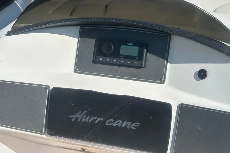 Slide: The Image of 2022 Hurricane Sundeck Sport 218 OB dashboard with Fusion audio system. - 11