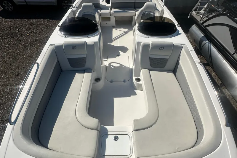 Slide: The Image of 2022 Hurricane Sundeck Sport 218 OB boat interior with spacious seating and modern design. - 17