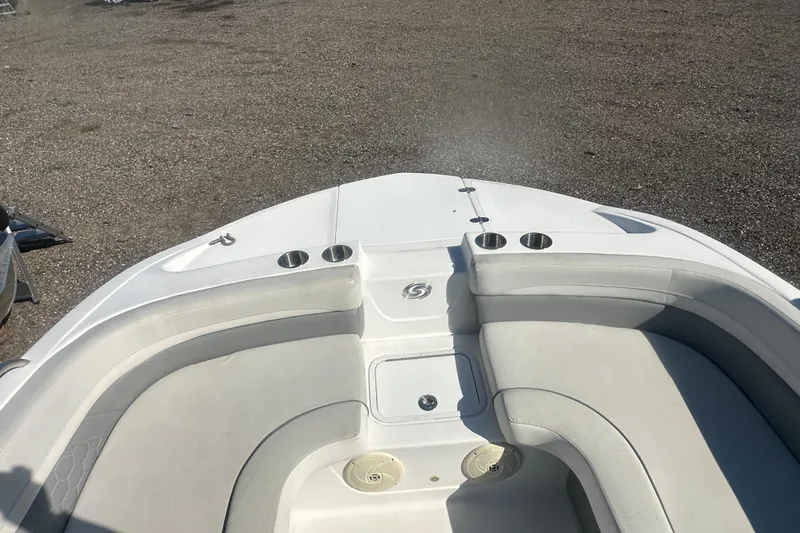 Slide: The Image of 2022 Hurricane Sundeck Sport 218 OB boat interior with seating and cup holders. - 20