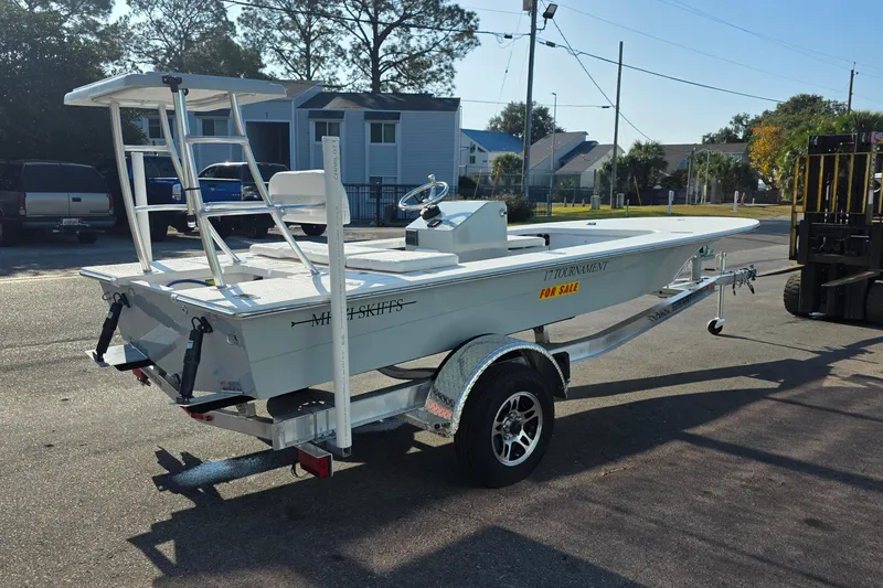 Slide: The Image of 2026 Mitzi Skiffs 17 Tournament boat on trailer, for sale in sunny neighborhood. - 2