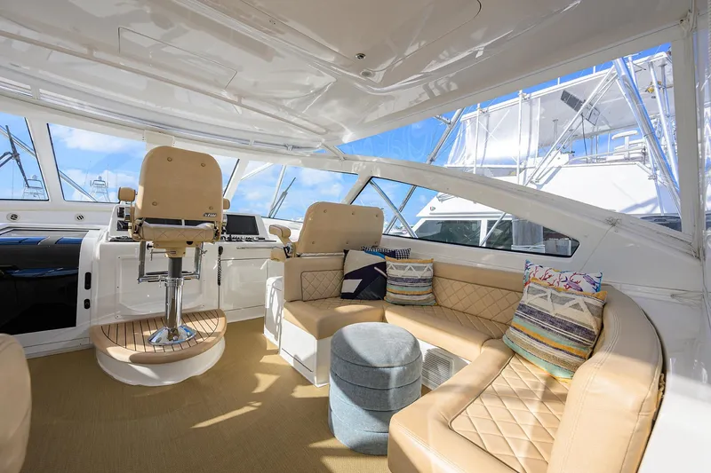 Slide: The Image of Luxurious interior of 2015 Viking 52 Open yacht with plush seating and helm station. - 24