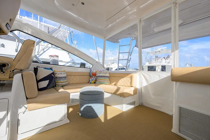 Slide: The Image of Luxurious interior of 2015 Viking 52 Open yacht with plush seating and nautical decor. - 27