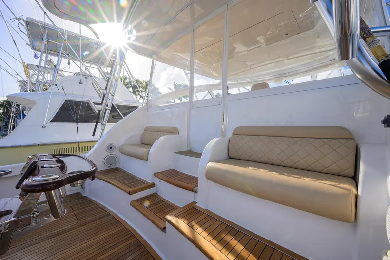 Slide: The Image of Luxurious 2015 Viking 52 Open yacht with elegant seating and teak flooring. - 43