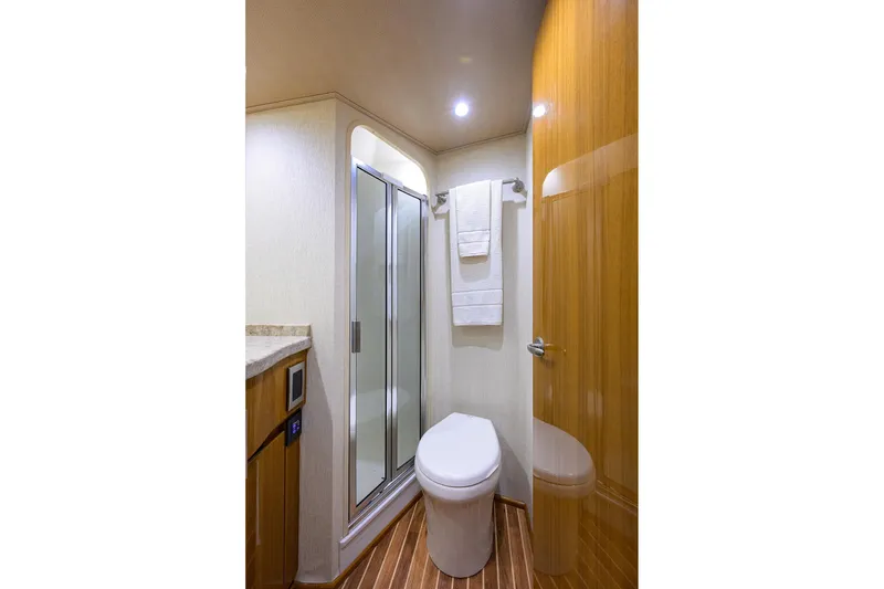 Slide: The Image of Luxurious bathroom in 2015 Viking 52 Open yacht with shower and modern amenities. - 55