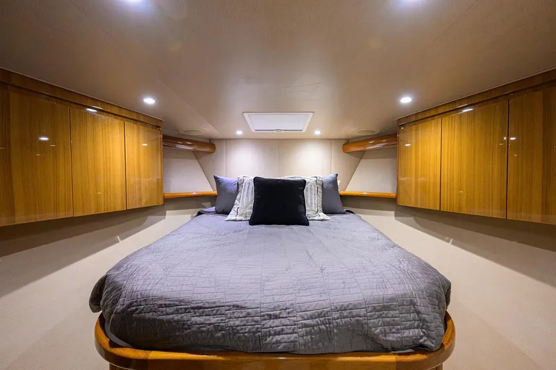 Slide: The Image of Luxurious cabin interior of 2015 Viking 52 Open yacht with elegant wood finishes. - 59