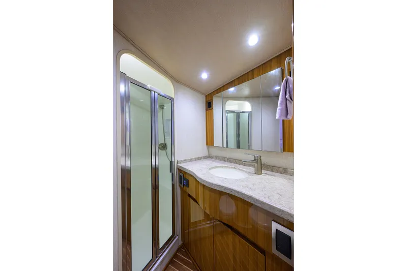 Slide: The Image of Luxurious bathroom in 2015 Viking 52 Open yacht with modern fixtures and shower. - 62