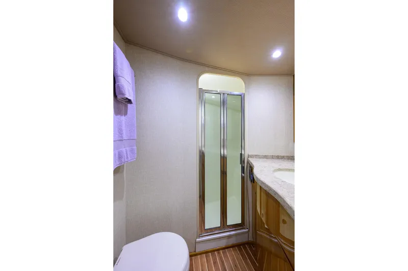 Slide: The Image of Luxurious bathroom in 2015 Viking 52 Open yacht with shower and elegant fixtures. - 63