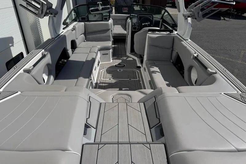 Slide: The Image of 2019 Supra SE 575 boat interior with spacious seating and modern design. - 10