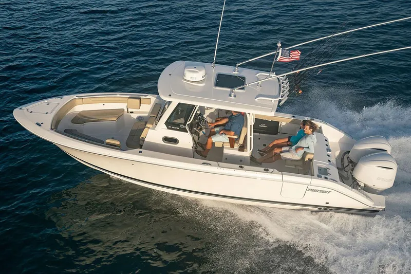 Slide: The Image of Manufacturer Provided Image: 2025 Pursuit S 288 Sport boat cruising on open water. - 5