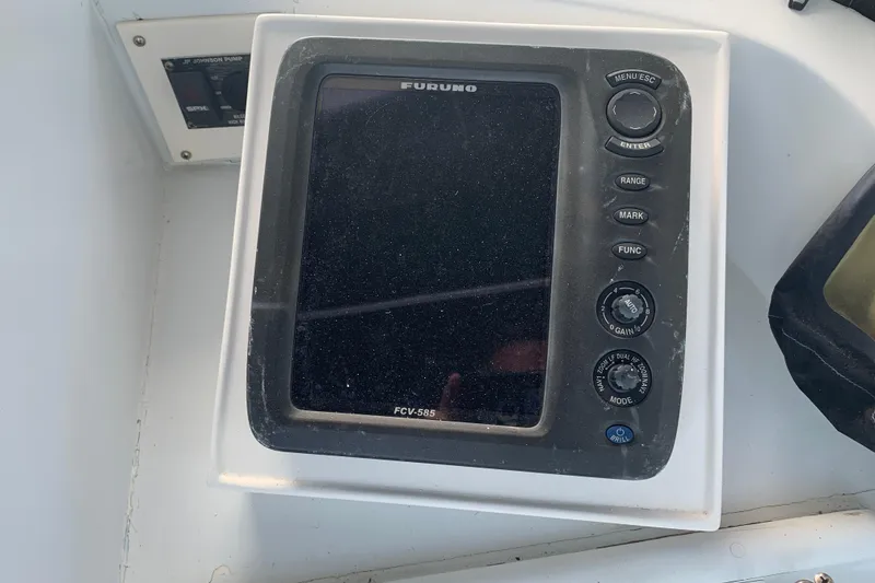 Slide: The Image of Furuno FCV-585 marine display on 1974 Bertram 31 Flybridge Cruiser dashboard. - 21
