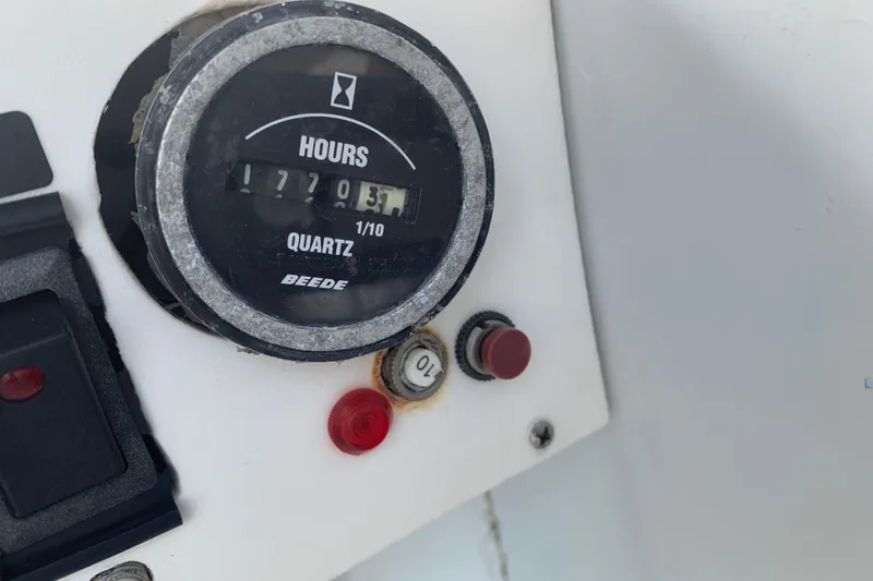 Slide: The Image of Hour meter on 1974 Bertram 31 Flybridge Cruiser, showing 1770.3 hours. - 26