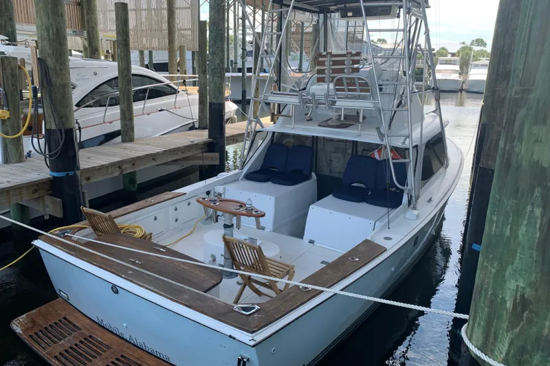 Slide: The Image of 1974 Bertram 31 Flybridge Cruiser docked in marina, Mobile, Alabama. - 4