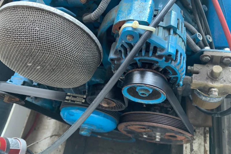 Slide: The Image of Close-up of a 1974 Bertram 31 Flybridge Cruiser engine components. - 40