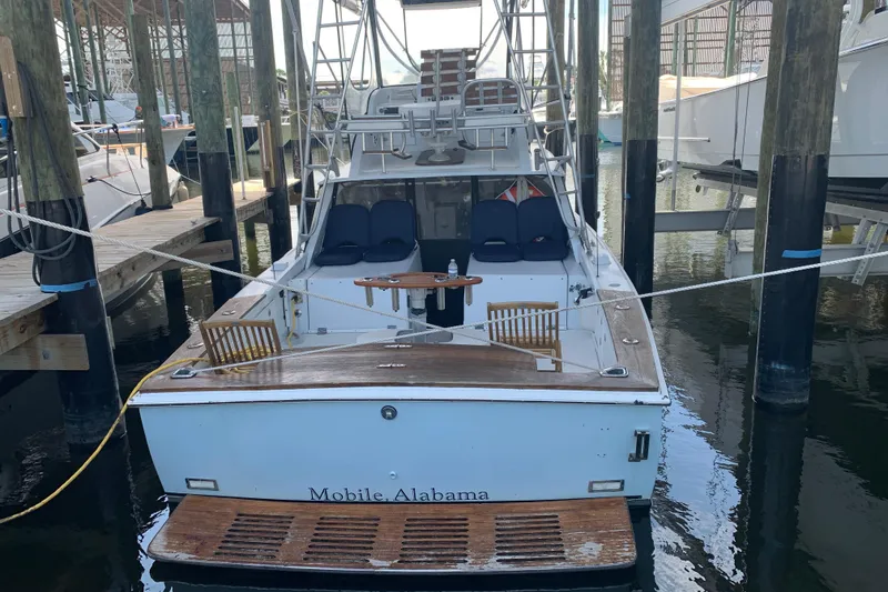Slide: The Image of 1974 Bertram 31 Flybridge Cruiser docked in Mobile, Alabama marina. - 53