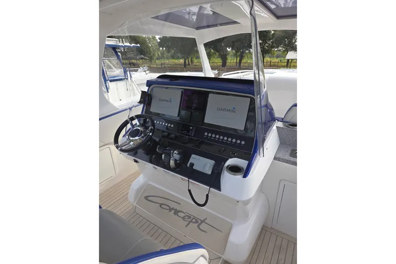 Slide: The Image of Helm of 2019 Concept 44' Cuddy Cabin boat with Garmin navigation system. - 17