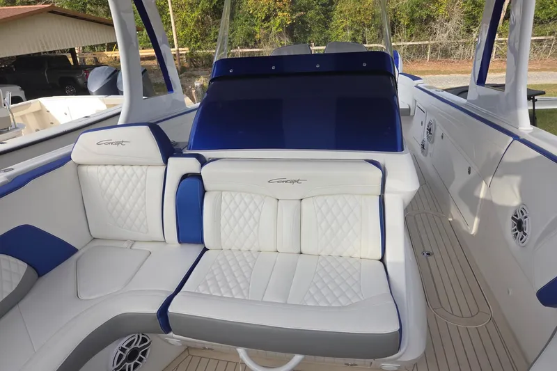 Slide: The Image of Luxurious 2019 Concept 44' Cuddy Cabin boat interior with white and blue seating. - 20