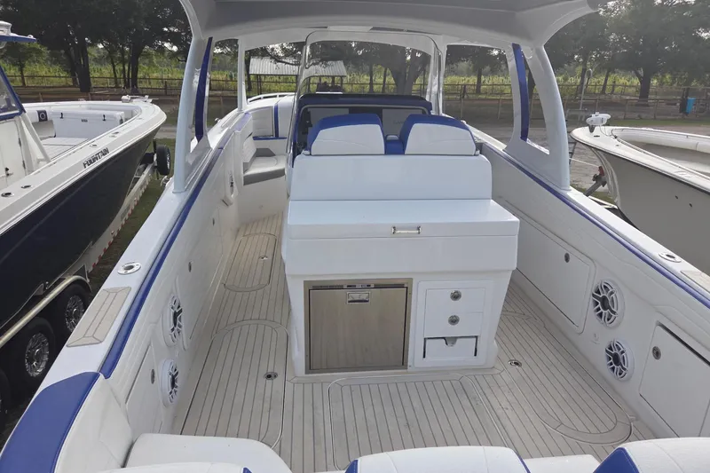 Slide: The Image of 2019 Concept 44' Cuddy Cabin boat interior with seating and storage, featuring sleek design elements. - 22