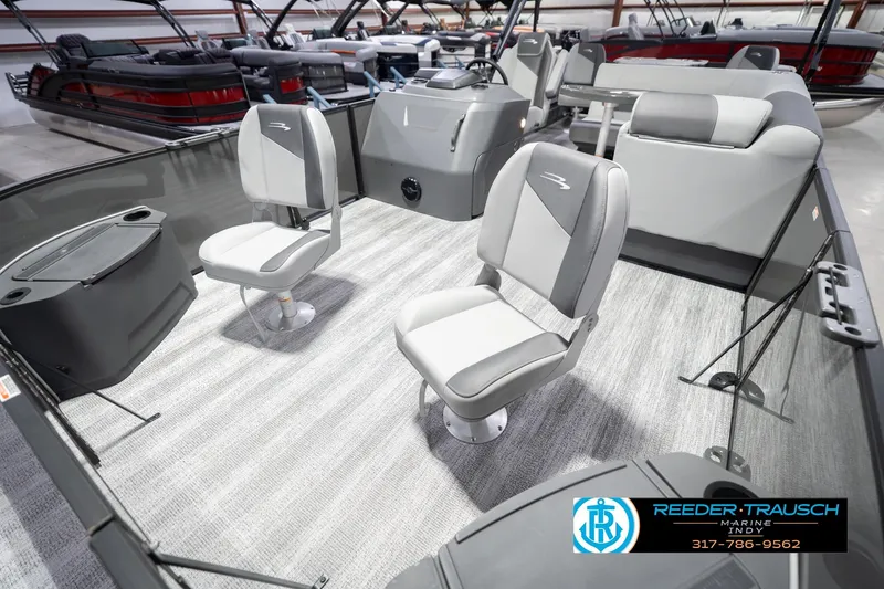Slide: The Image of 2026 Bennington 22 SF boat interior with gray seating and modern design. - 12