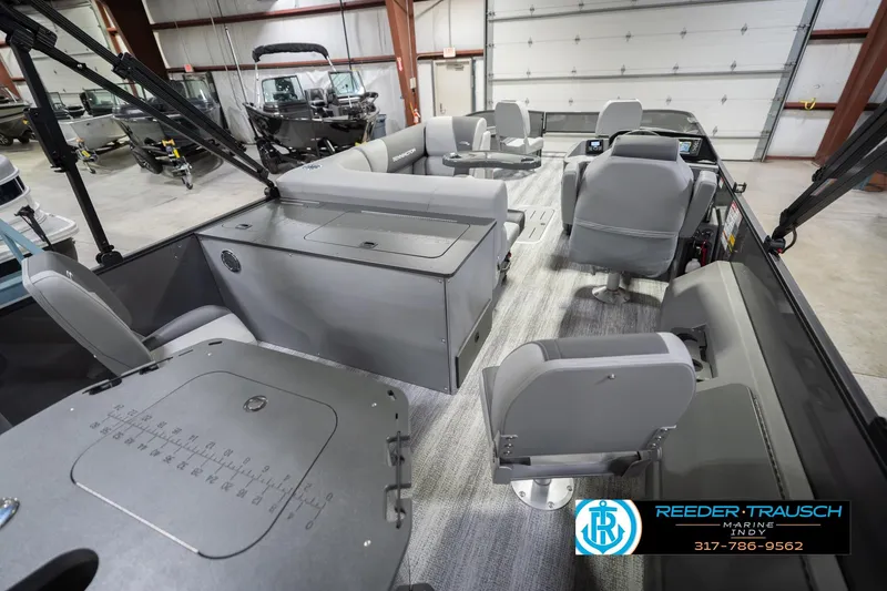 Slide: The Image of Interior of a 2026 Bennington 22 SF boat, featuring modern seating and control panel. - 14