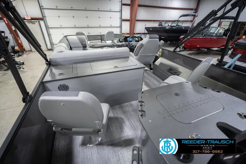 Slide: The Image of Interior of 2026 Bennington 22 SF pontoon boat with modern seating and controls. - 15