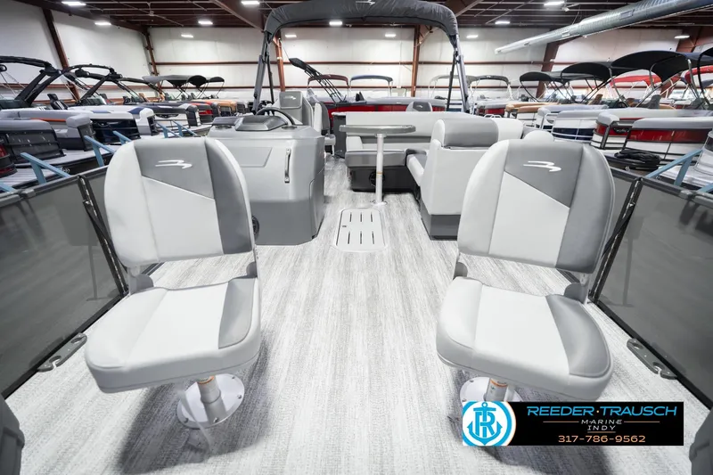 Slide: The Image of 2026 Bennington 22 SF pontoon boat interior with gray seating and modern design. - 16