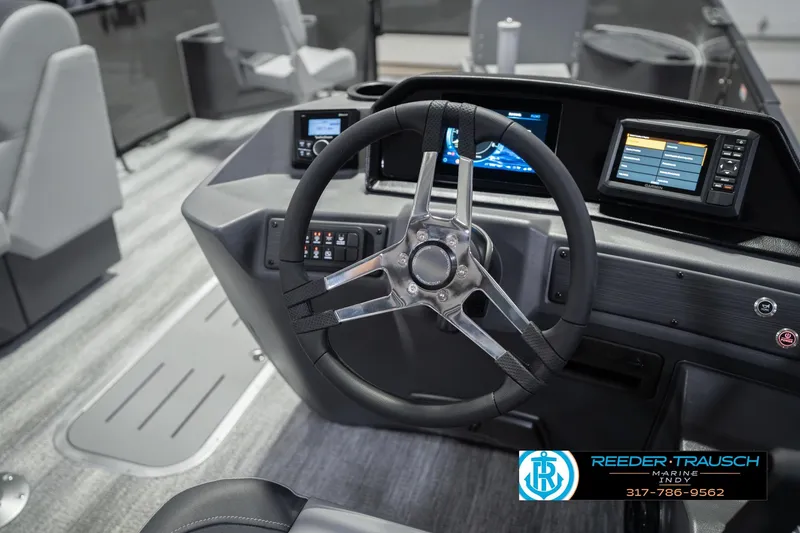 Slide: The Image of Steering console of 2026 Bennington 22 SF boat with modern controls and displays. - 40