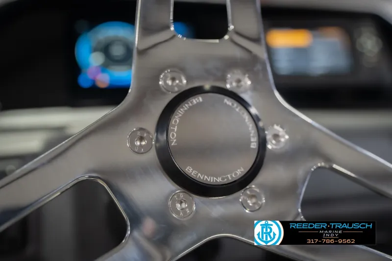 Slide: The Image of Close-up of 2026 Bennington 22 SF steering wheel with dashboard in background. - 42