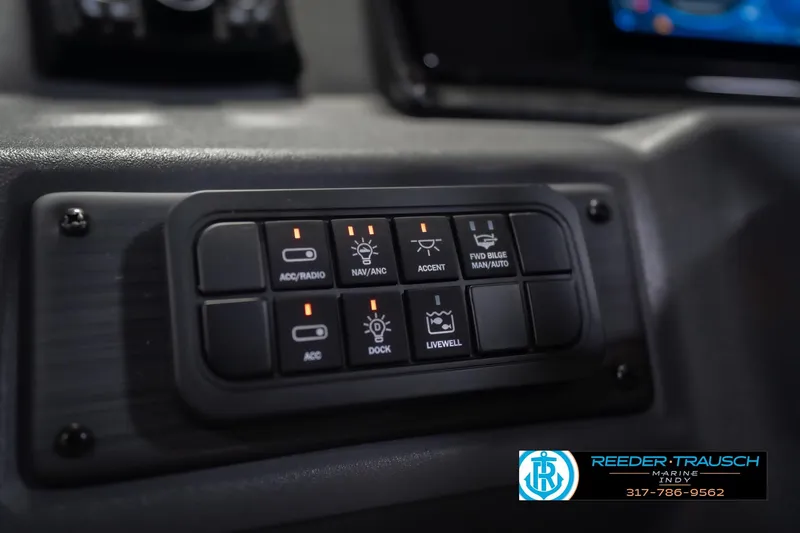 Slide: The Image of Control panel of 2026 Bennington 22 SF boat with various function buttons. - 43
