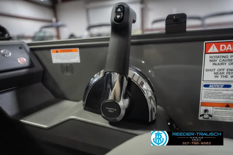 Slide: The Image of Throttle control of 2026 Bennington 22 SF boat with safety warnings and Reeder Trausch Marine logo. - 47