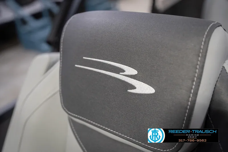 Slide: The Image of 2026 Bennington 22 SF boat seat with logo, featuring sleek gray upholstery. - 49