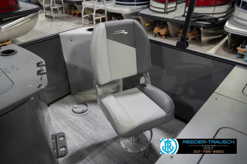 Slide: The Image of 2026 Bennington 22 SF boat interior with a sleek, modern captain's chair. - 50
