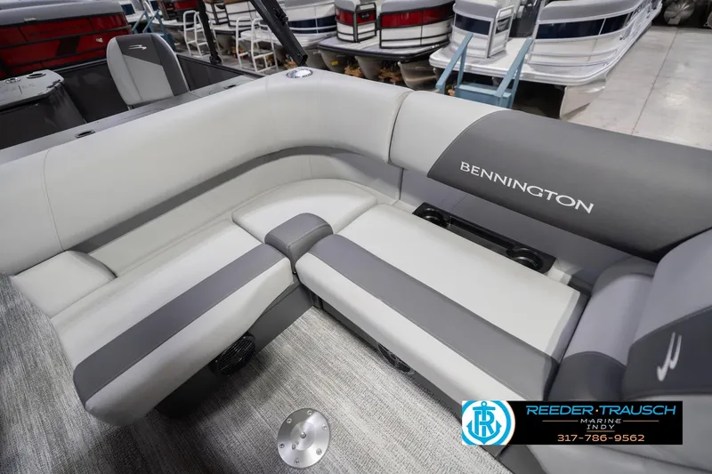 Slide: The Image of 2026 Bennington 22 SF boat interior with gray seating and branding. - 51
