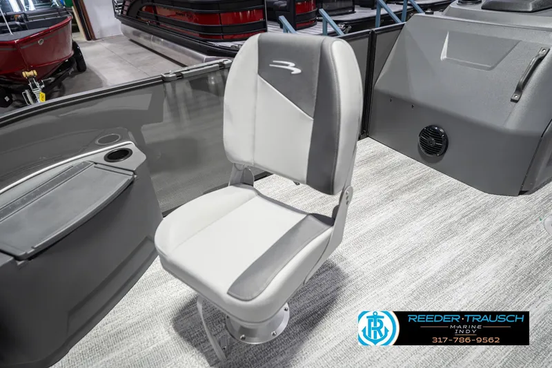 Slide: The Image of 2026 Bennington 22 SF boat interior with gray seating and console details. - 52