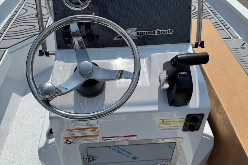 Slide: The Image of Steering console of 2026 Xpress H20B Bay boat with Yamaha controls. - 3